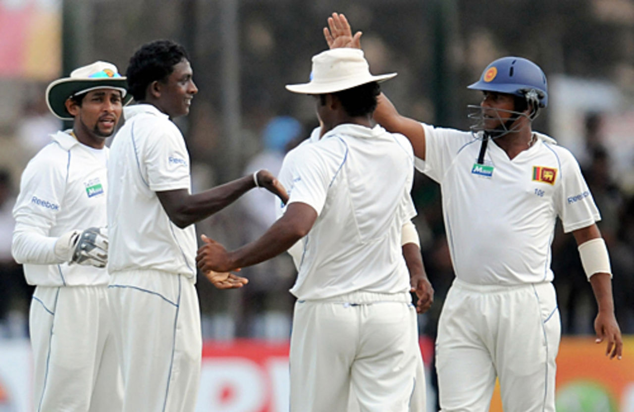 Ajantha Mendis gets the congratulations on removing Khurram Manzoor, Pakistan v Sri Lanka, 1st Test, Galle, 3rd day, July 6, 2009 