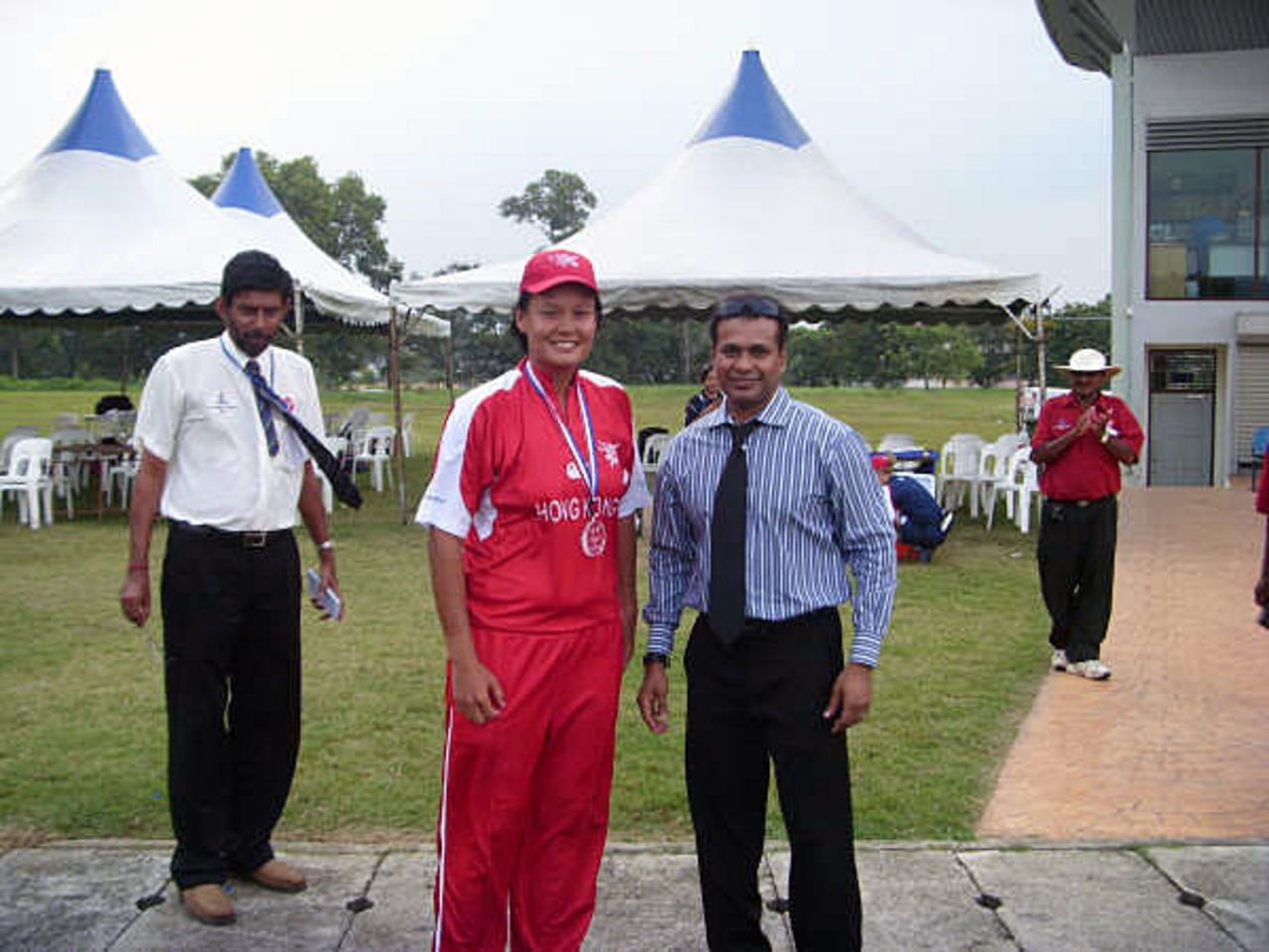 Connie Wong receives her Player of the Match Award from Mr. KK Haridas, ACC Events Executive, after claiming 4-8 against Oman Women at the ACC Women's Twenty20 Championships 2009 in Malaysia