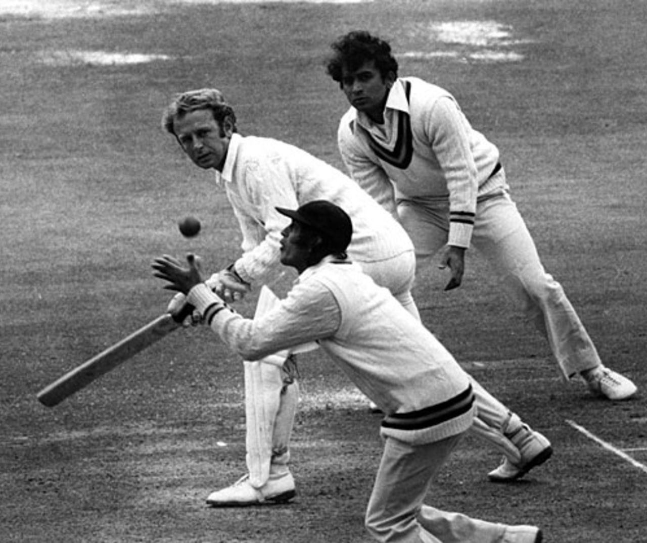Eknath Solkar takes a catch off Derek Underwood as Sunil Gavaskar watches from silly point, England v India, 1st Test, Old Trafford, 2nd day, June 7, 1974