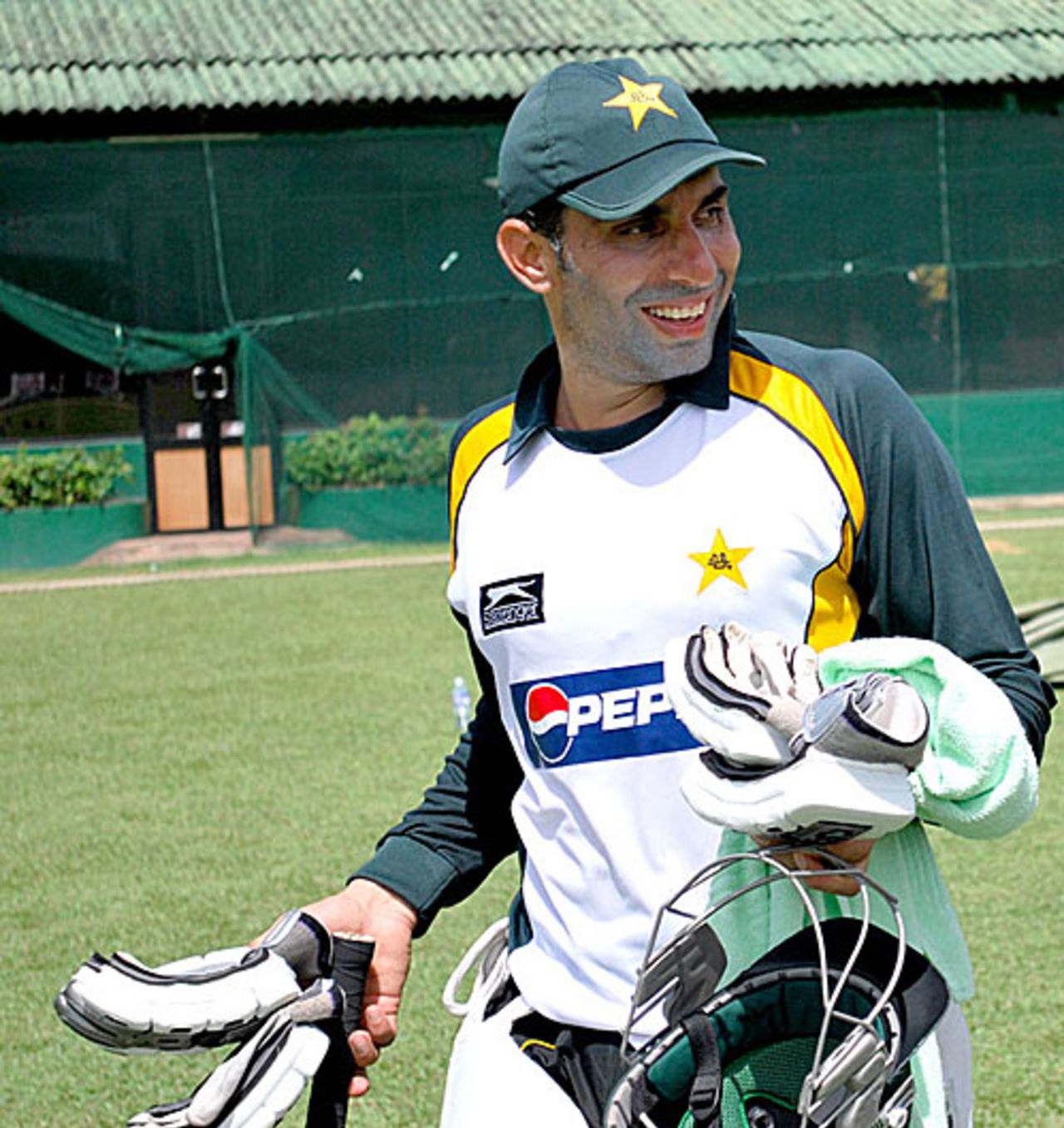 Misbah-ul-Haq enjoys a light moment during training, Colombo, July 10, 2009