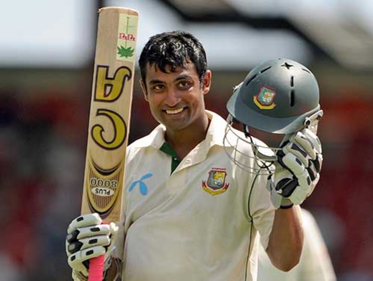 Tamim Iqbal smiles and acknowledges the dressing room after getting to his century, West Indies v Bangladesh, 1st Test, Kingstown, 4th day, July 12, 2009
