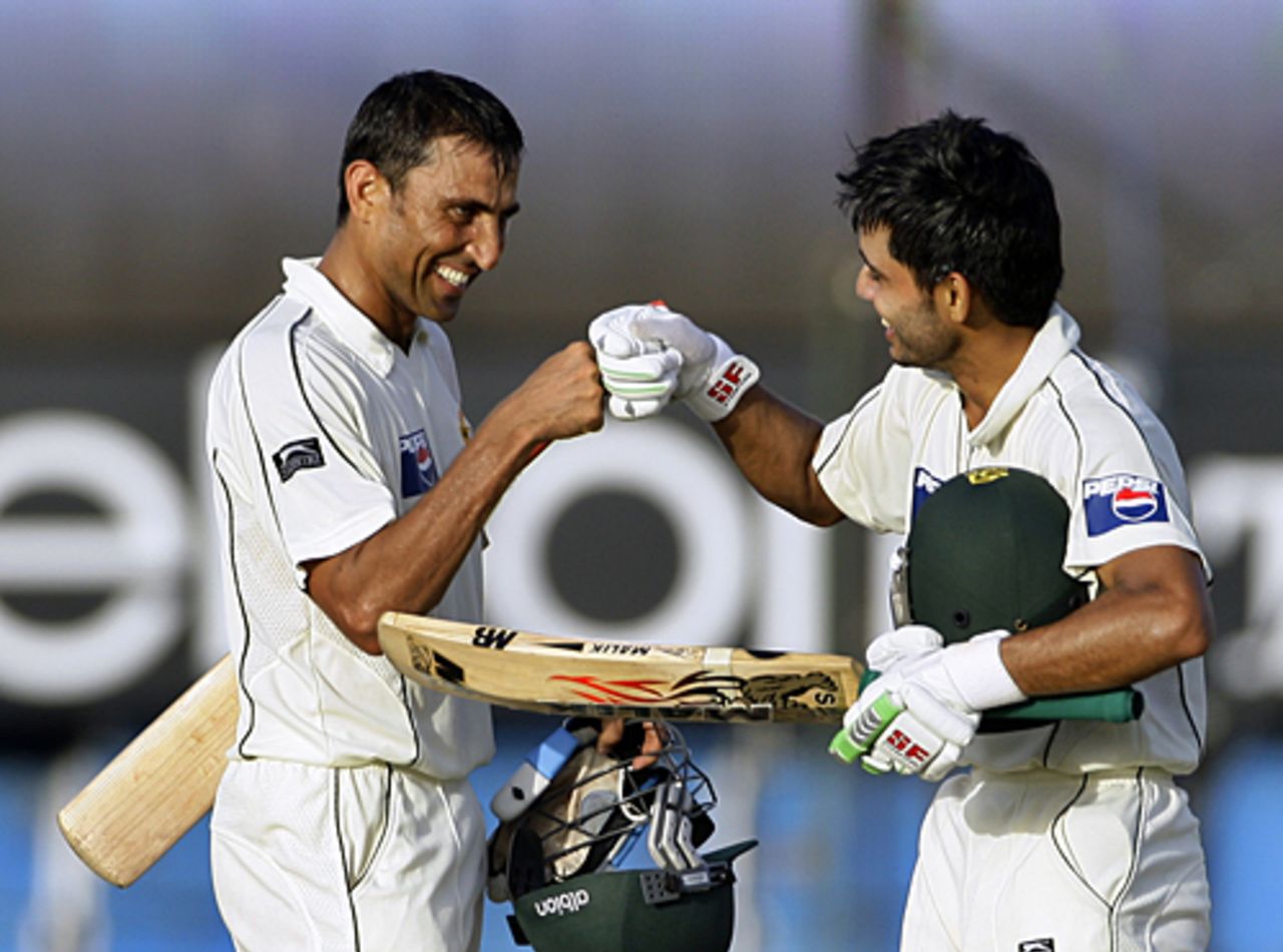 Younis Khan congratulates Fawad Alam on getting to his century, Sri Lanka v Pakistan, 2nd Test, Colombo, 2nd day, July 13, 2009