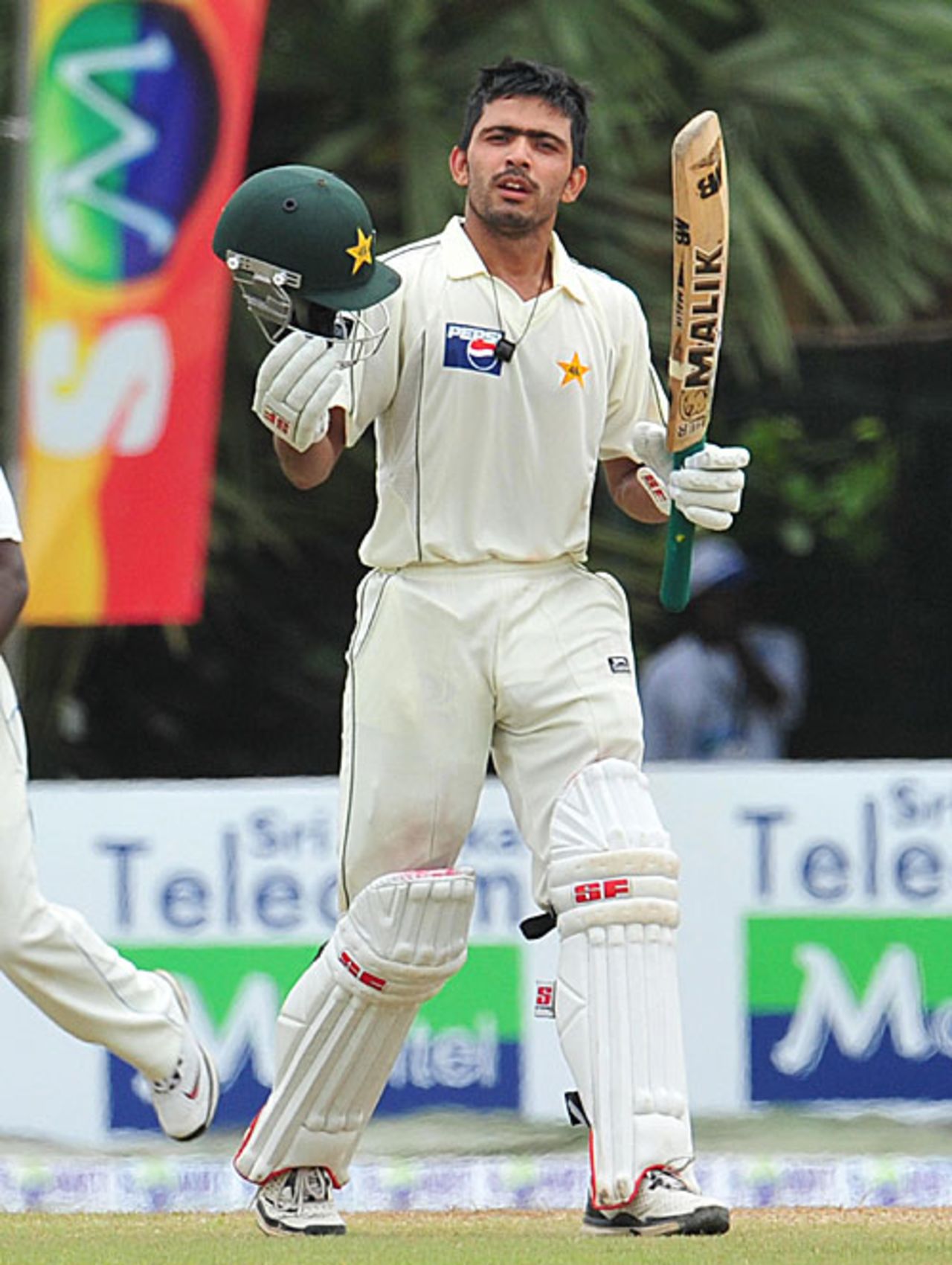 Fawad Alam raises his bat after reaching 150, Sri Lanka v Pakistan, 2nd Test, Colombo, 3rd day, July 14, 2009 