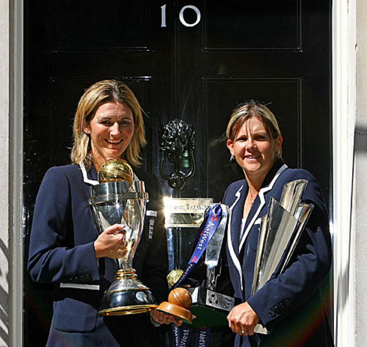 Charlotte Edwards and Nicky Shaw pose outside 10 Downing Street, London, July 14, 2009