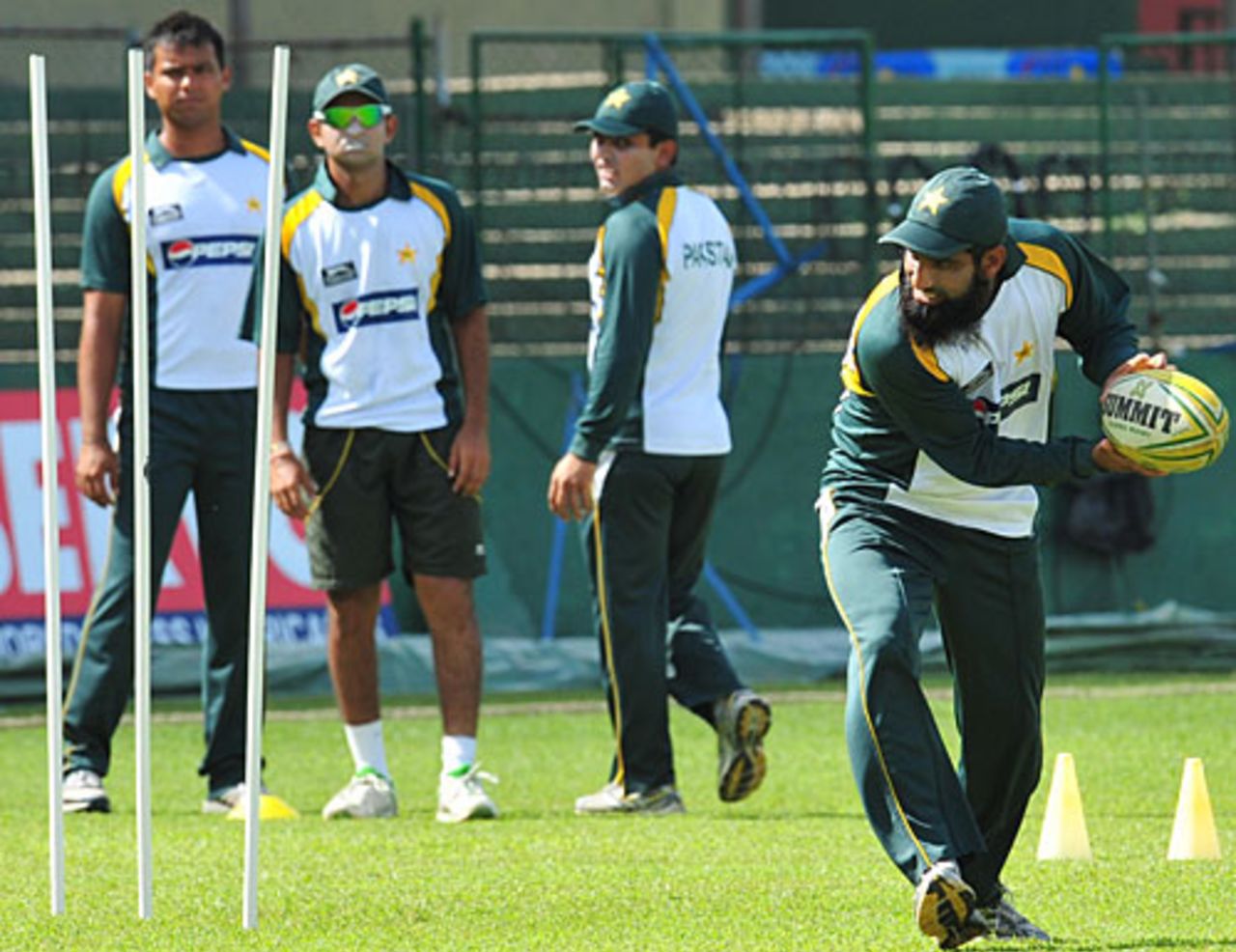 Mohammad Yousuf plays with a rugby ball, Colombo, July 19, 2009
