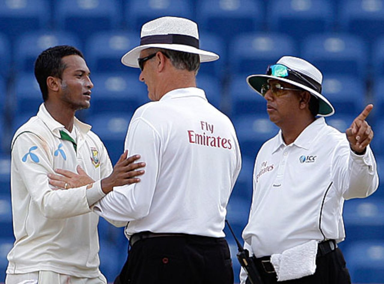 Shakib Al Hasan has a chat with umpires Asoka de Silva and Tony Hill, West Indies v Bangladesh, 2nd Test, Grenada, 3rd day, July 19, 2009 