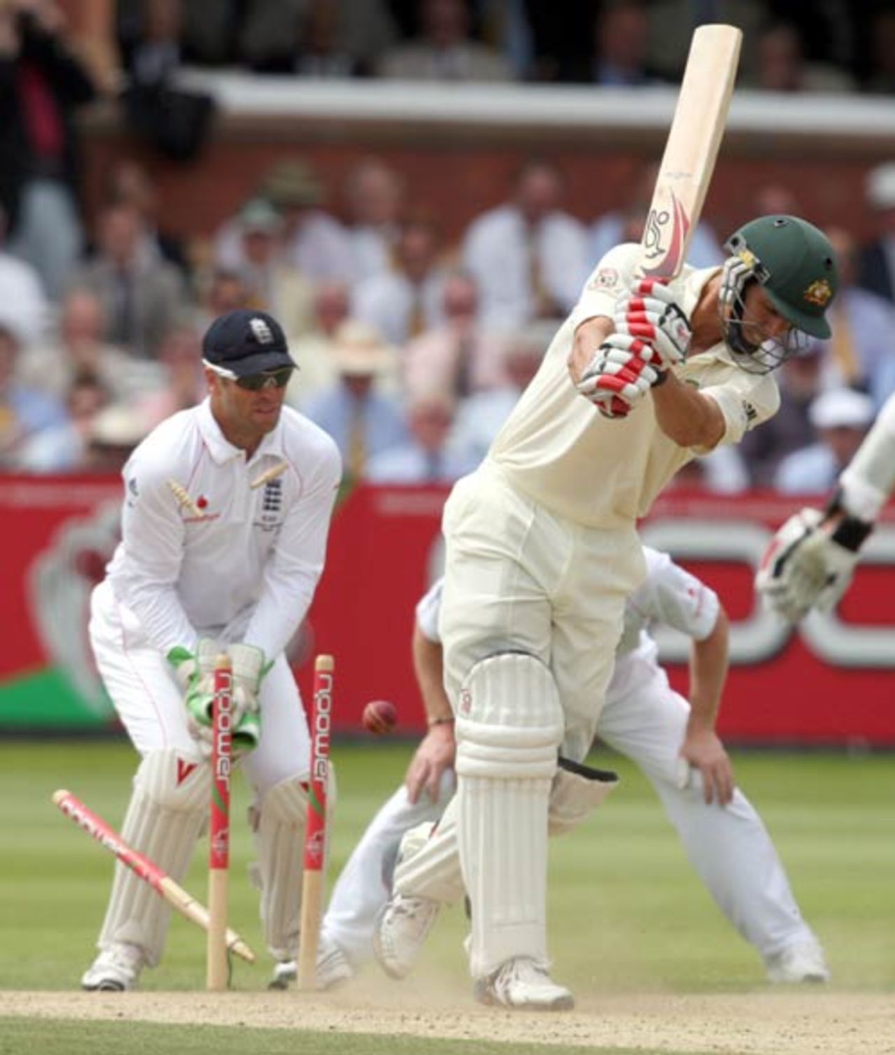 Mitchell Johnson is bowled by Graeme Swann, the final wicket in England's victory, England v Australia, 2nd Test, Lord's, 5th day, July 20, 2009