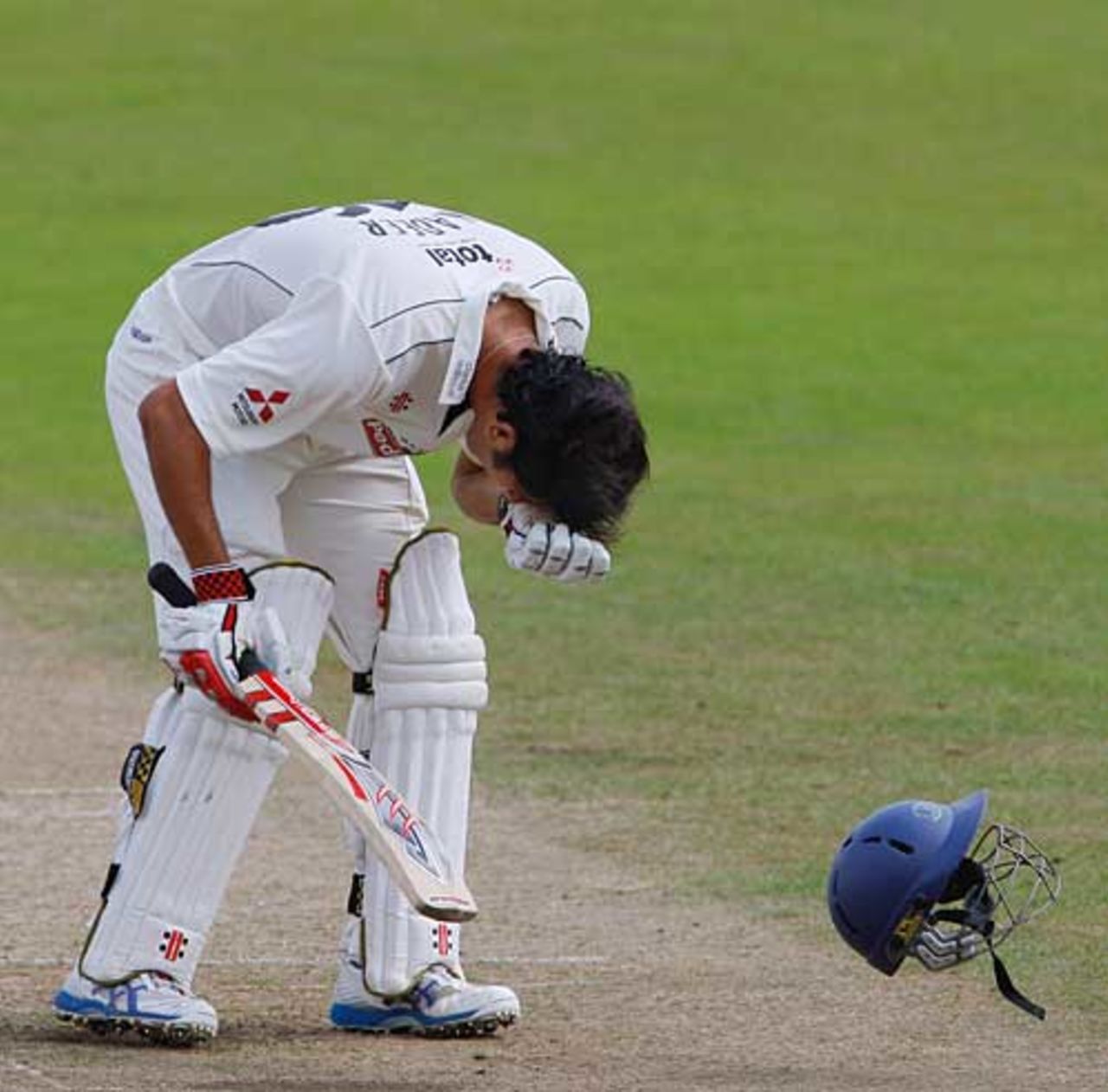 Kadeer Ali was forced to retire hurt after a blow from Johan van der Wath, Gloucestershire v Northamptonshire, County Championship, Cheltenham, July 20, 2009