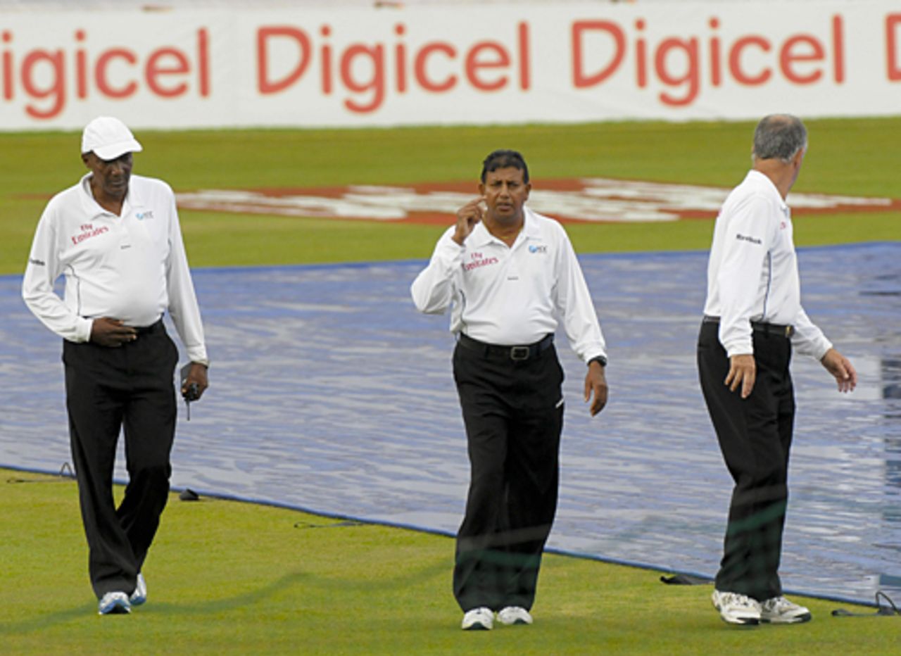 The umpires do a recce of the playing conditions, West Indies v Bangladesh, 2nd Test, Grenada, 4th day, July 20, 2009 