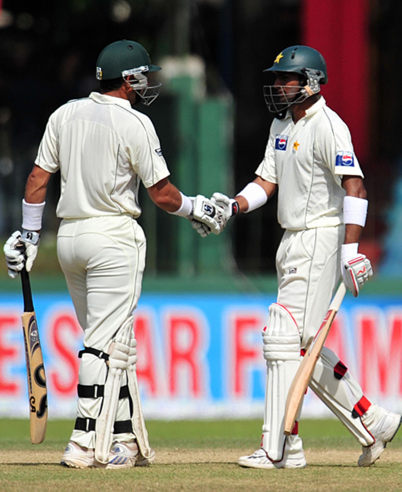 Misbah-ul-Haq and Shoaib Malik complete their century stand, Sri Lanka v Pakistan, 3rd Test, Colombo, 3rd day, July 22, 2009