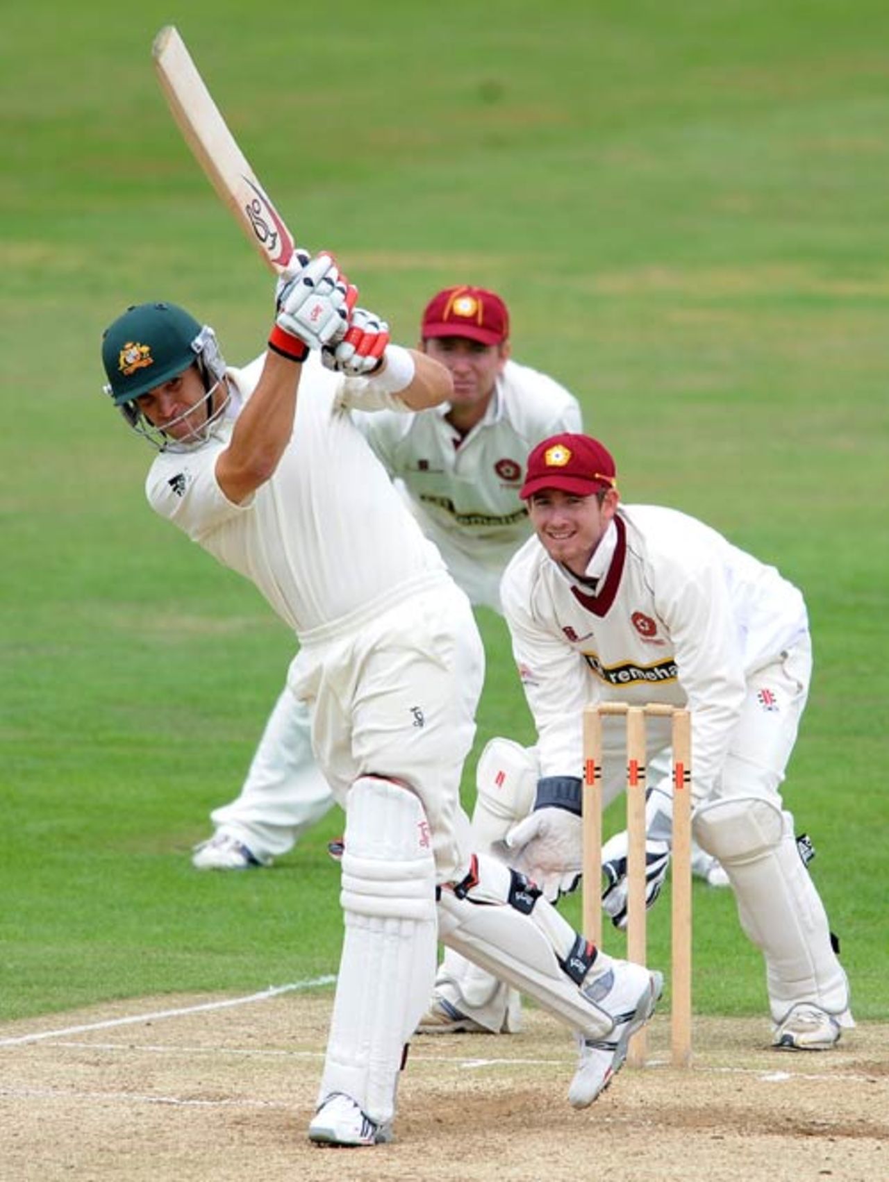 Graham Manou drives through the on-side on his way to a half-century, Northamptonshire v Australians, 3rd day, Northampton, July 26, 2009