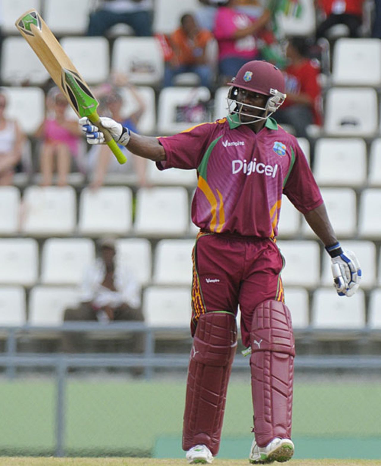 Devon Smith raises the bat after reaching a half-century, West Indies v Bangladesh, 1st ODI, Dominica, July 26, 2009