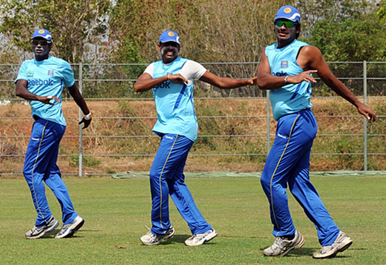 Kumar Sangakkara leads a warm-up session, Dambulla, July 28, 2009