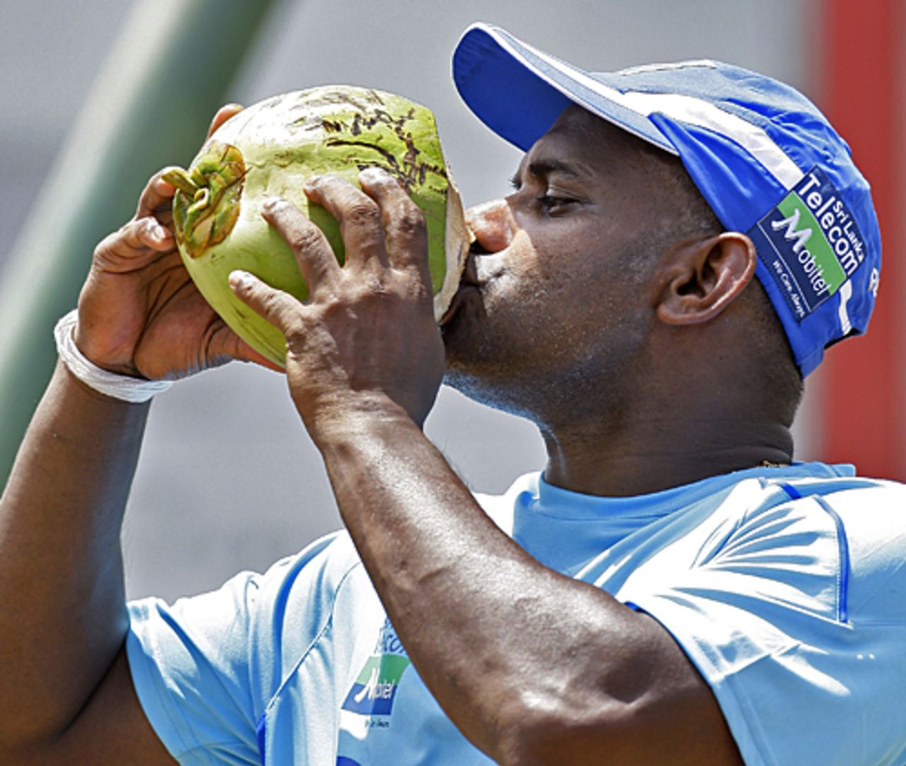 Sanath Jayasuriya refuels after a hard day's work at the nets, Dambulla, July 29, 2009