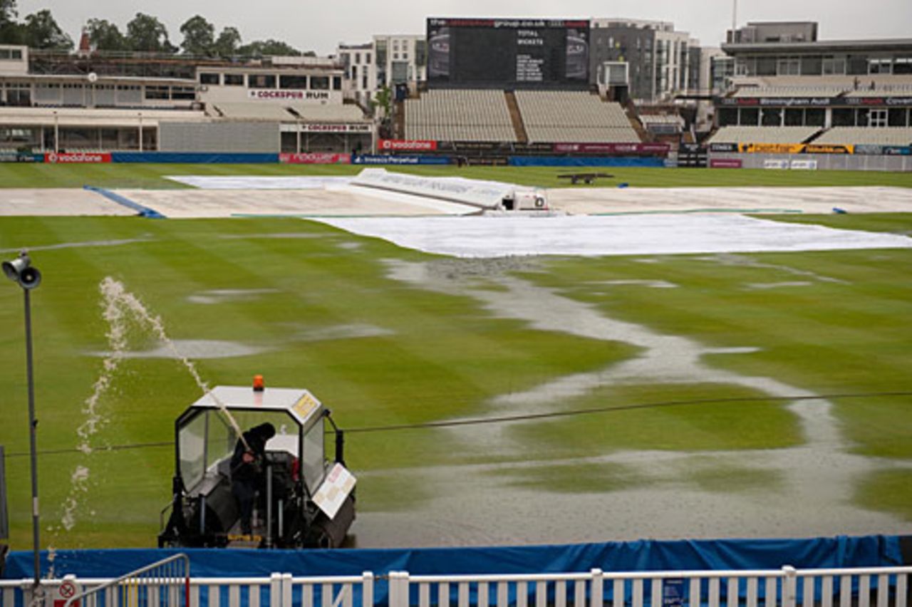 The groundsmen have their work cut out at Edgbaston, July 29, 2009