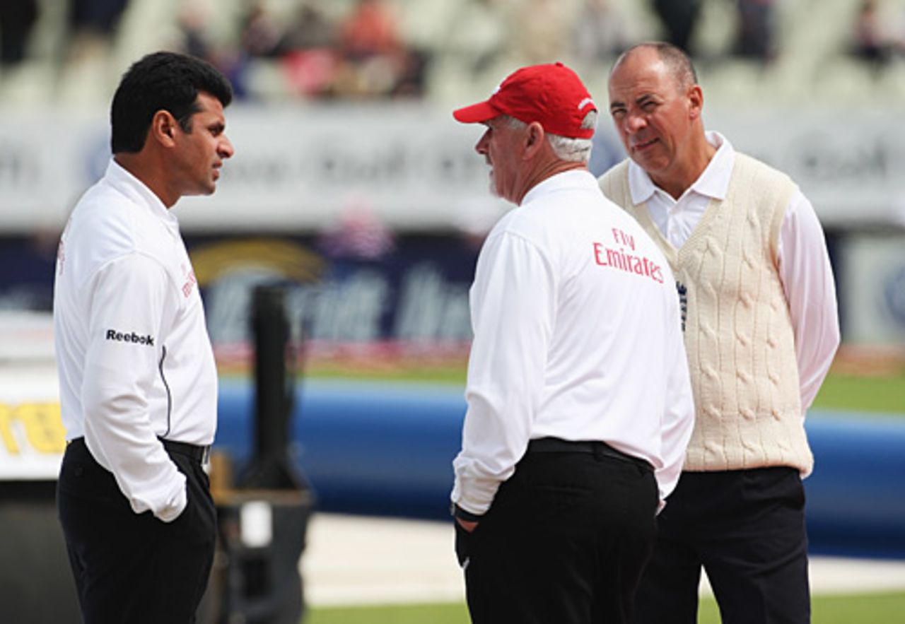 Pitch inspection: Umpires Aleem Dar (L) and Rudi Koertzen (C) talk with fourth umpire Tim Robinson, England v Australia, 3rd Test, Edgbaston, 1st day, July 30, 2009