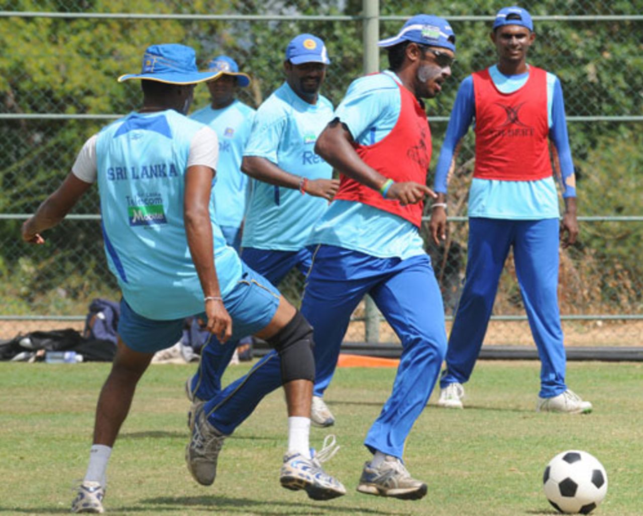 Chamara Kapugedera enjoys a game of football with his Sri Lankan team-mates in Dambulla, July 31, 2009