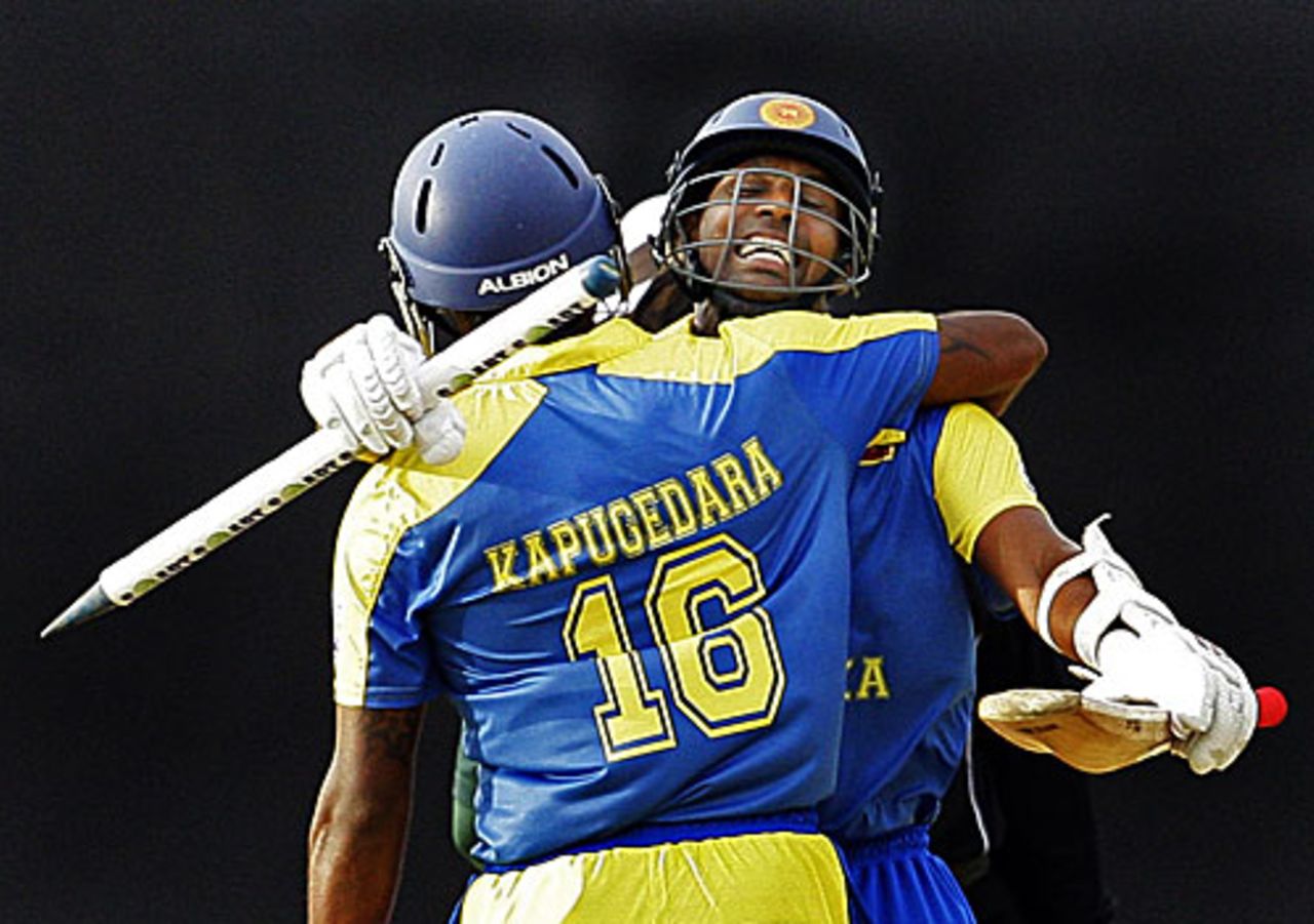 Thilan Samaraweera and Chamara Kapugedera hug after taking Sri Lanka to victory, Sri Lanka v Pakistan, 2nd ODI, Dambulla, August 1, 2009 