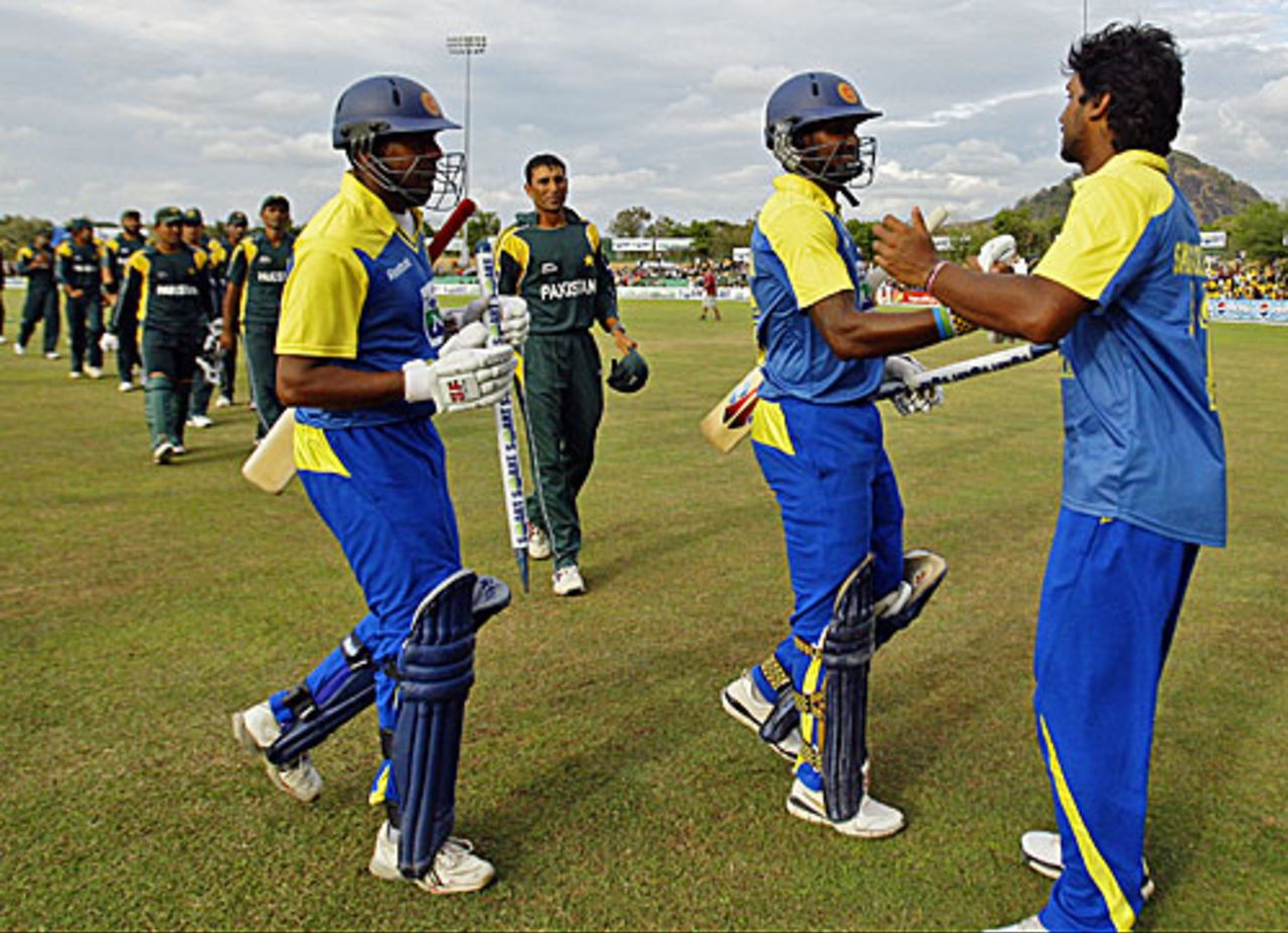 Kumar Sangakkara congratulates Chamara Kapugedera and Thilan Samaraweera after the victory, Sri Lanka v Pakistan, 2nd ODI, Dambulla, August 1, 2009 