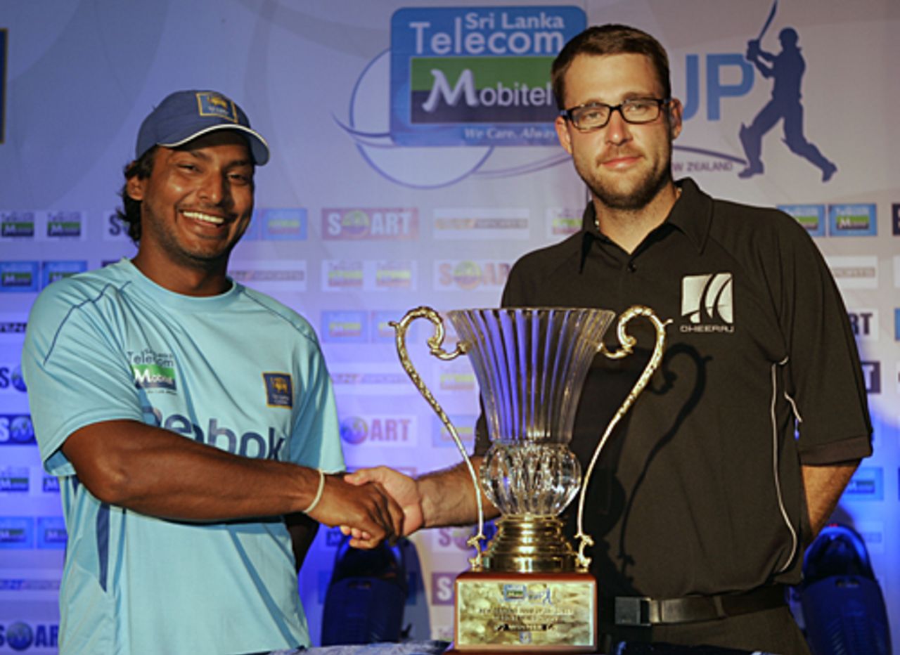 Kumar Sangakkara and Daniel Vettori pose with the Test series trophy, Colombo, August 6, 2009