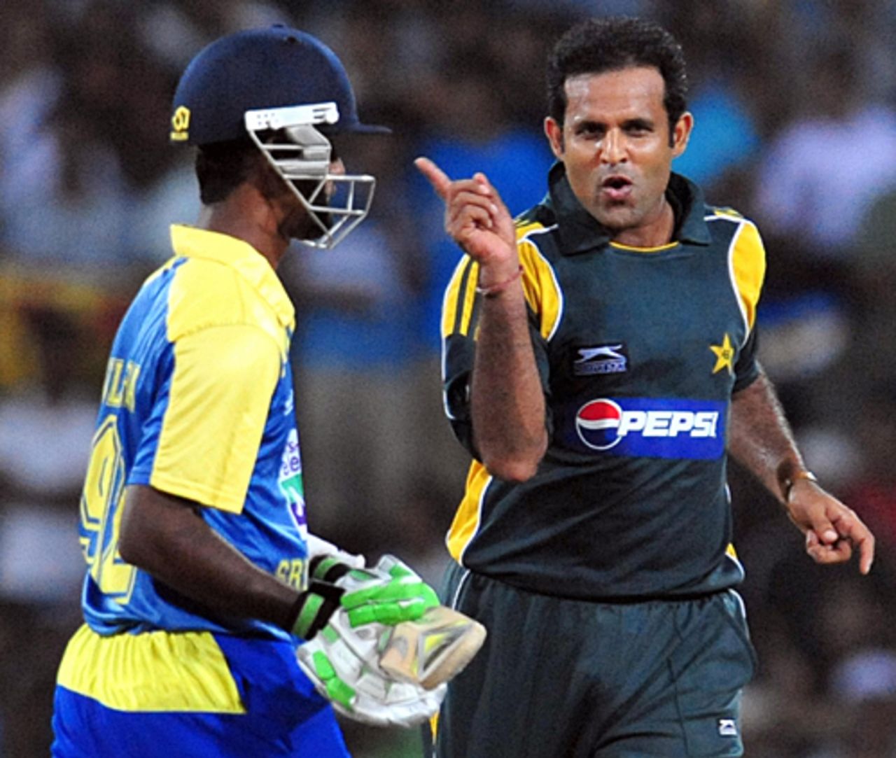 Naved-ul-Hasan shows Nuwan Kulasekera the exit route, Sri Lanka v Pakistan, only Twenty20 international, Colombo, August 12, 2009