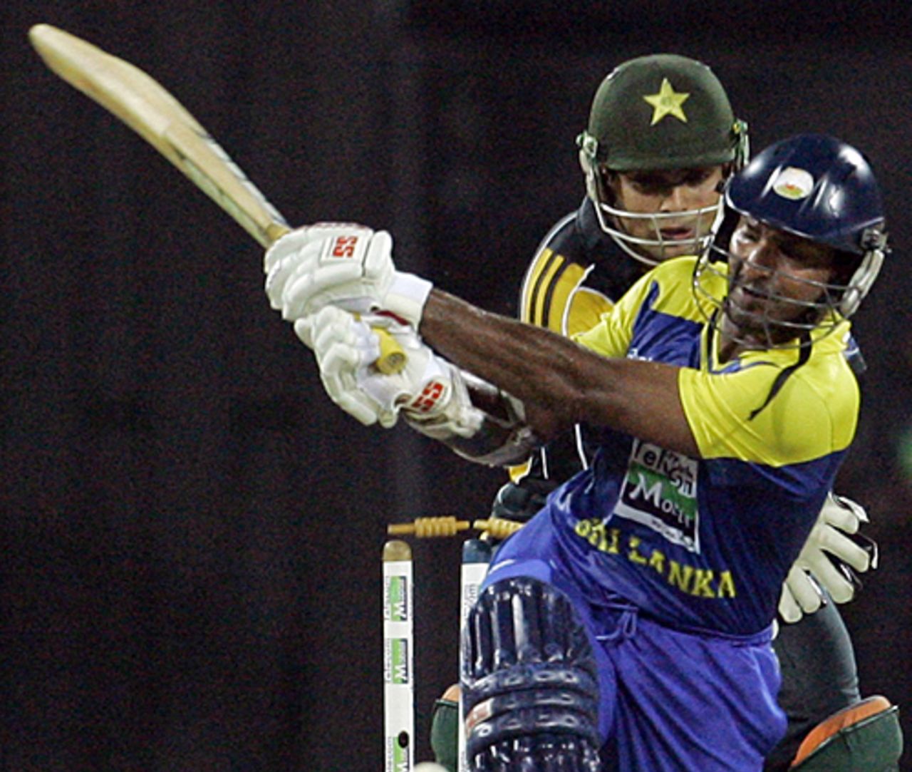Kumar Sangakkara goes for the sweep, Sri Lanka v Pakistan, only Twenty20 international, Colombo, August 12, 2009