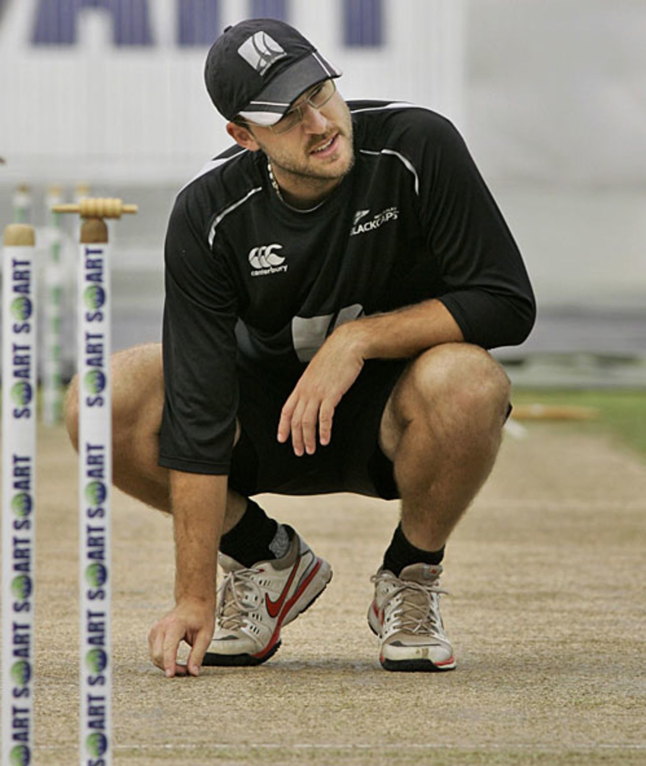 Daniel Vettori inspects the pitch after morning showers, Sri Lanka v New Zealand, 1st Test, Galle, 1st day, August 18, 2009