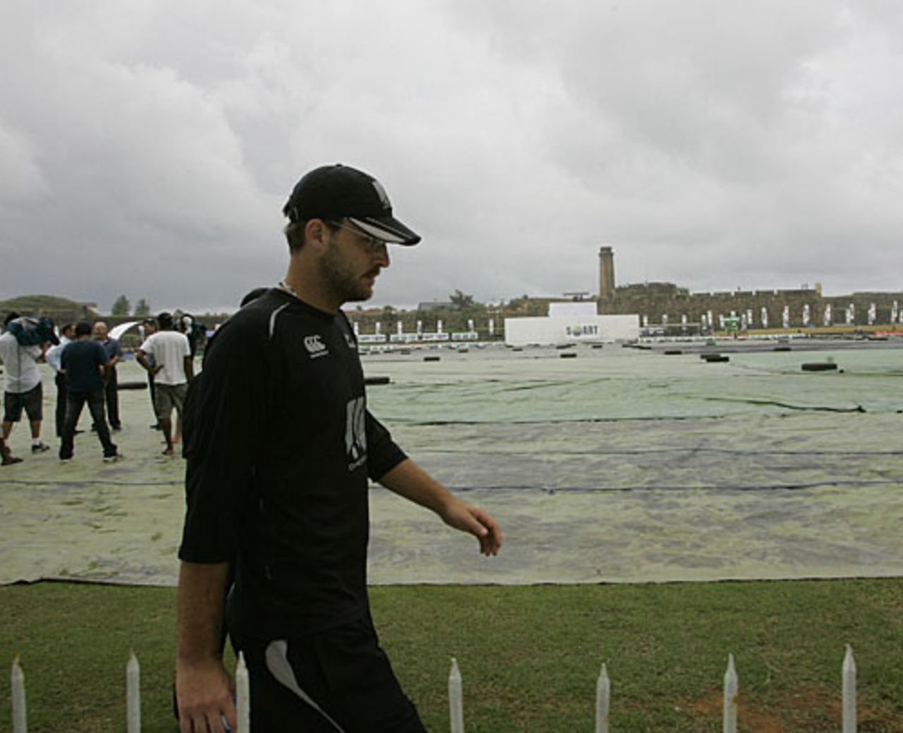 Daniel Vettori walks back after start is delayed, Sri Lanka v New Zealand, 1st Test, Galle, 1st day, August 18, 2009