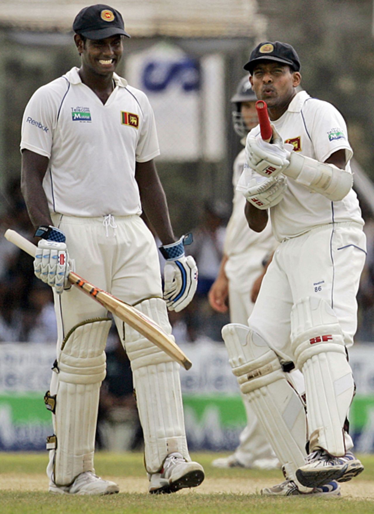 Thilan Samaraweera celebrates his hundred with Angelo Mathews, Sri Lanka v New Zealand, 1st Test, Galle, 2nd day, August 19, 2009