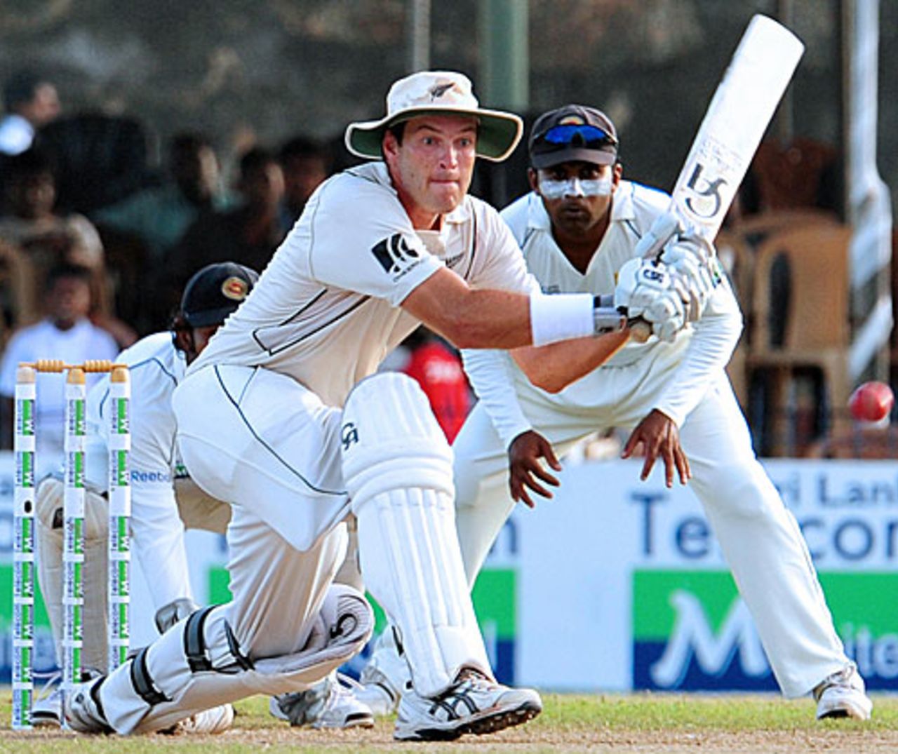Tim McIntosh gets in position to sweep, Sri Lanka v New Zealand, 1st Test, Galle, 2nd day, August 19, 2009