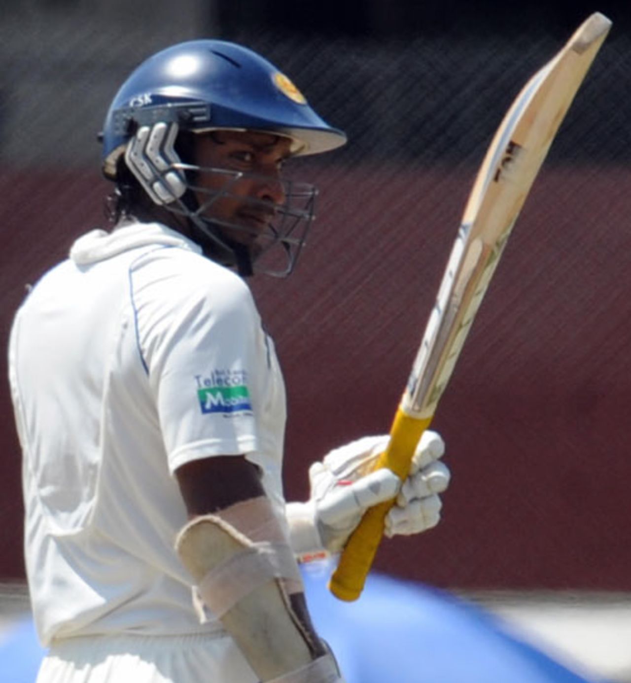 Kumar Sangakkara raises his bat on reaching a half-century, Sri Lanka v New Zealand, 2nd Test, SSC, Colombo, 1st day, August 26, 2009