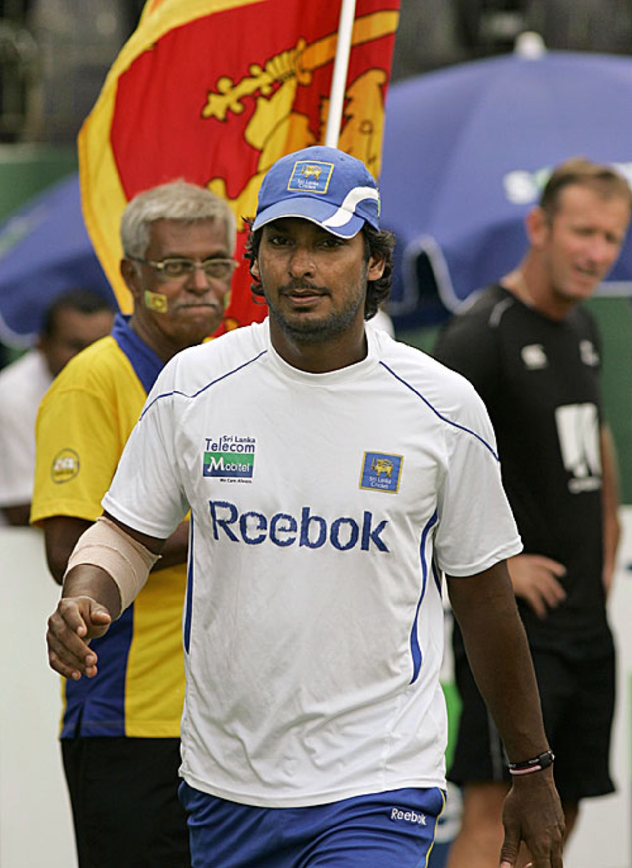 The victorious captain Kumar Sangakkara walks to pick up the series trophy, Sri Lanka v New Zealand, 2nd Test, SSC, 5th day, August 30, 2009