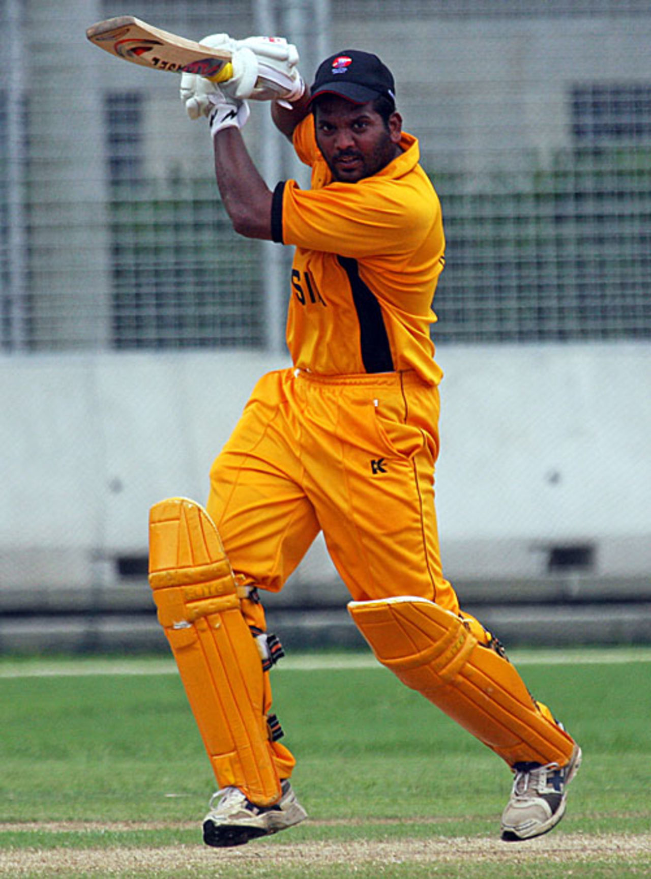 Malaysia's Rakesh Madhavan plays a stylish punch through the off side, Malaysia v Norway, ICC World Cricket League Division 6, Singapore, August 31, 2009 