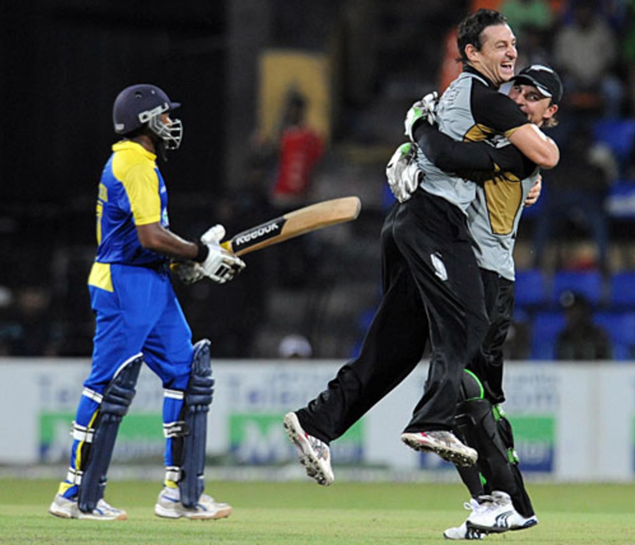 Brothers Nathan and Brendon McCullum celebrate Mahela Jayawardene's wicket, Sri Lanka v New Zealand, 2nd Twenty20, Colombo, September 4, 2009