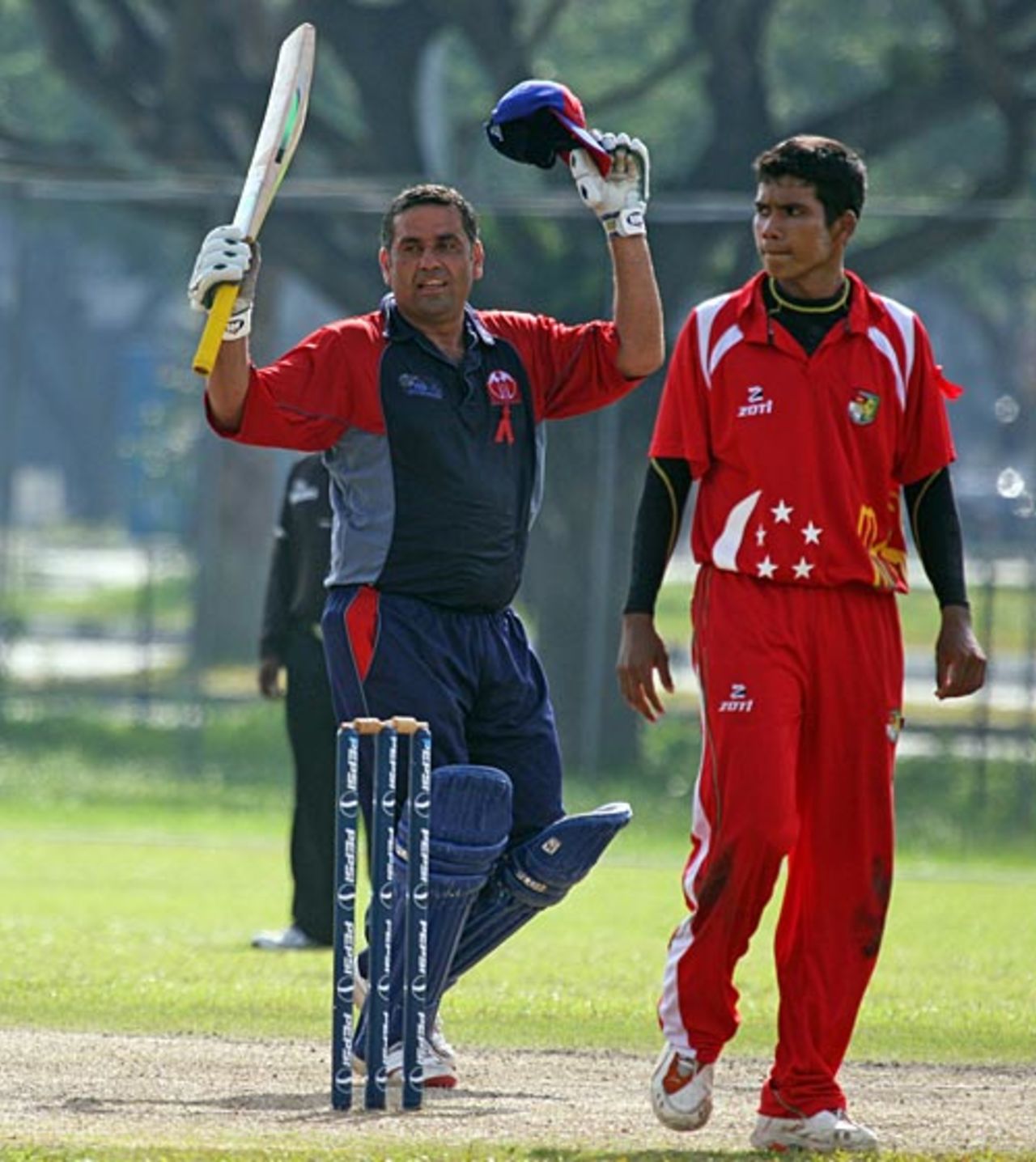 Tahir Dar celebrates his half-century, Bahrain v Singapore, ICC World Cricket League Division 6, Singapore, September 5, 2009