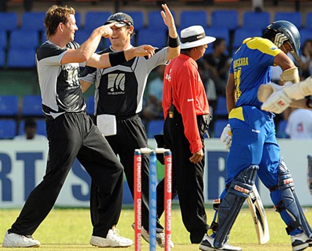 Ian Butler sees off Kumar Sangakkara, Sri Lanka v New Zealand, 1st match, Compaq Cup, Colombo, September 8, 2009