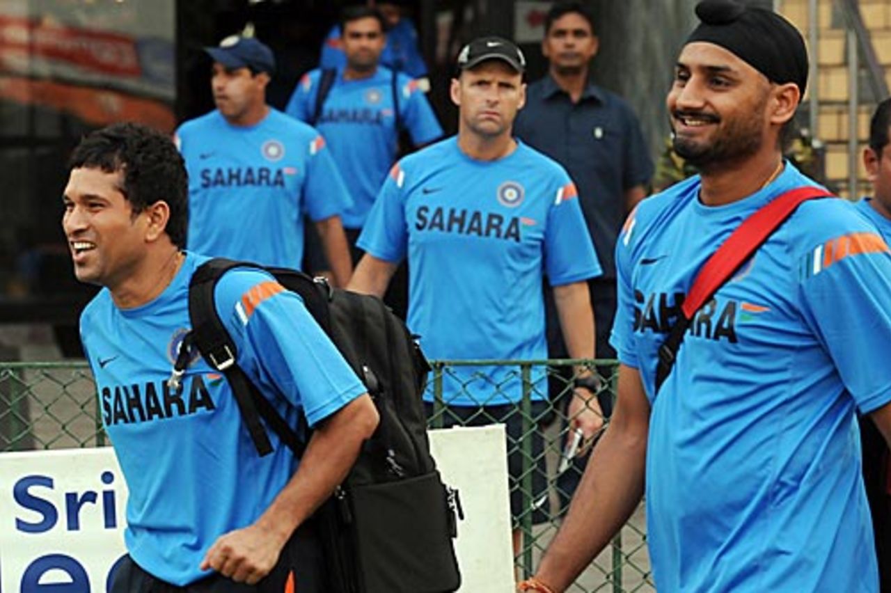 Sachin Tendulkar and Harbhajan Singh are all smiles as they head out for a net session, Colombo, September 9, 2009