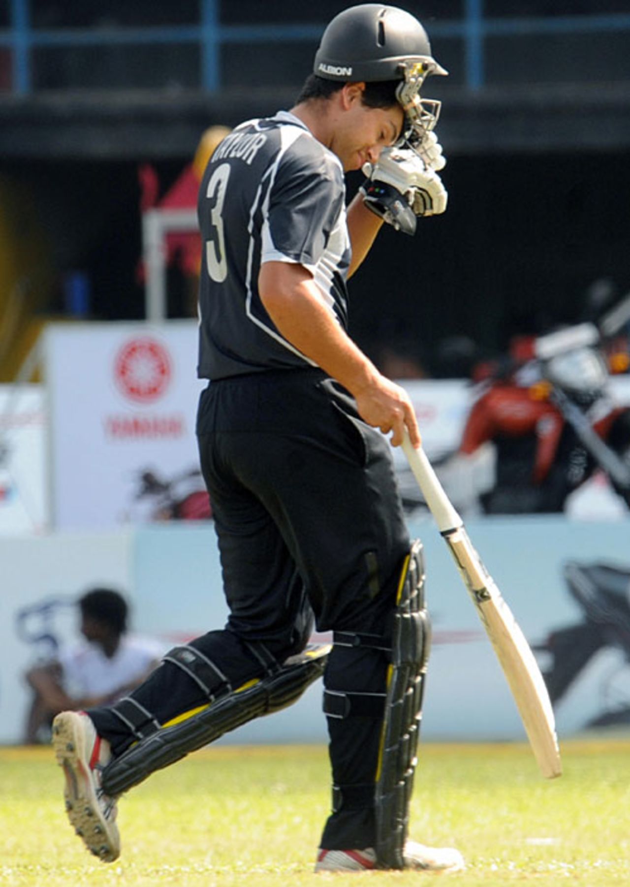 Ross Taylor walks back after being caught behind for 11, India v New Zealand, 2nd match, Compaq Cup, Colombo, September 11, 2009
