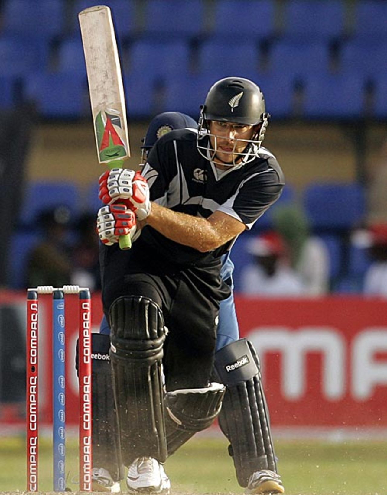 Daniel Vettori drives through the leg side, India v New Zealand, 2nd match, Compaq Cup, Colombo, September 11, 2009