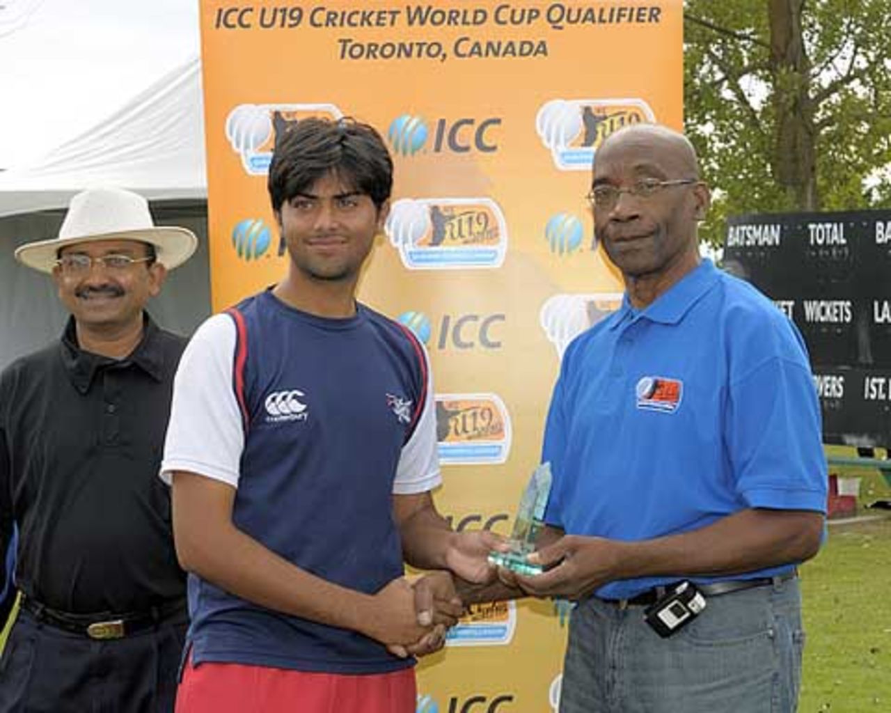 Niaz Ali accepts his Man of the Match Award after claiming 5-13 against Vanuatu at the ICC Under-19 Cricket World Cup Qualifier played in Toronto, Canada