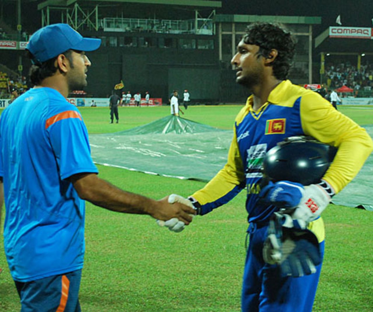 MS Dhoni and Kumar Sangakkara shake hands at the end of the match, Sri Lanka v India, Compaq Cup, 3rd match, Colombo, September 12, 2009