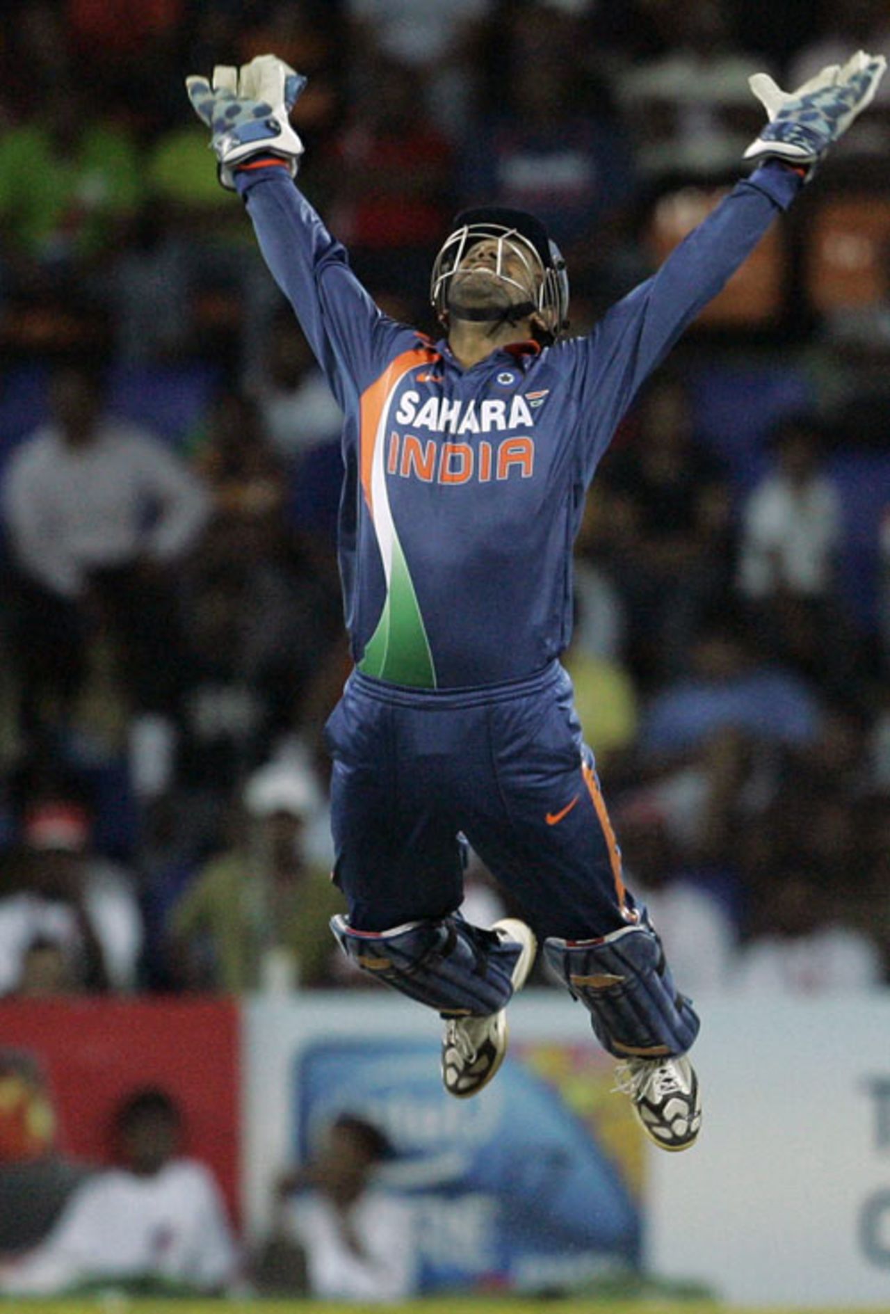 MS Dhoni jumps for joy after completing a catch, Sri Lanka v India, Compaq Cup, final, Colombo, September 14, 2009