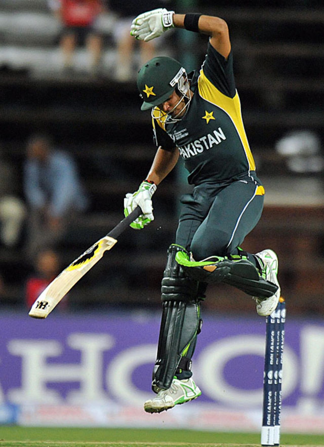 Umar Akmal winces in pain after taking the beamer on his knuckle, Pakistan v West Indies, ICC Champions Trophy, Group A, Johannesburg, September 23, 2009