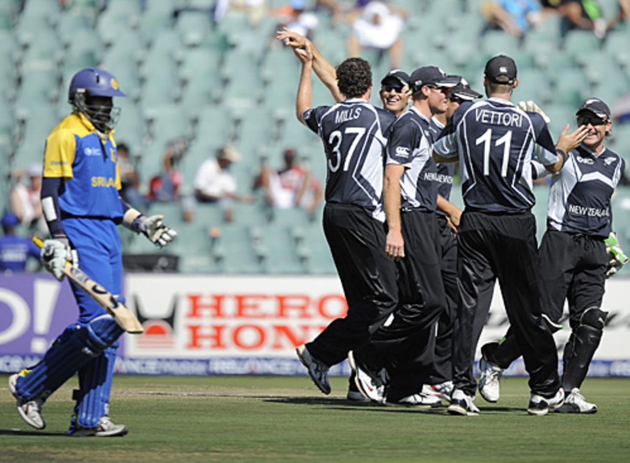 Kyle Mills is mobbed by team-mates after sending back Tillakaratne Dilshan, New Zealand v Sri Lanka, ICC Champions Trophy, Group B, Johannesburg, September 27, 2009