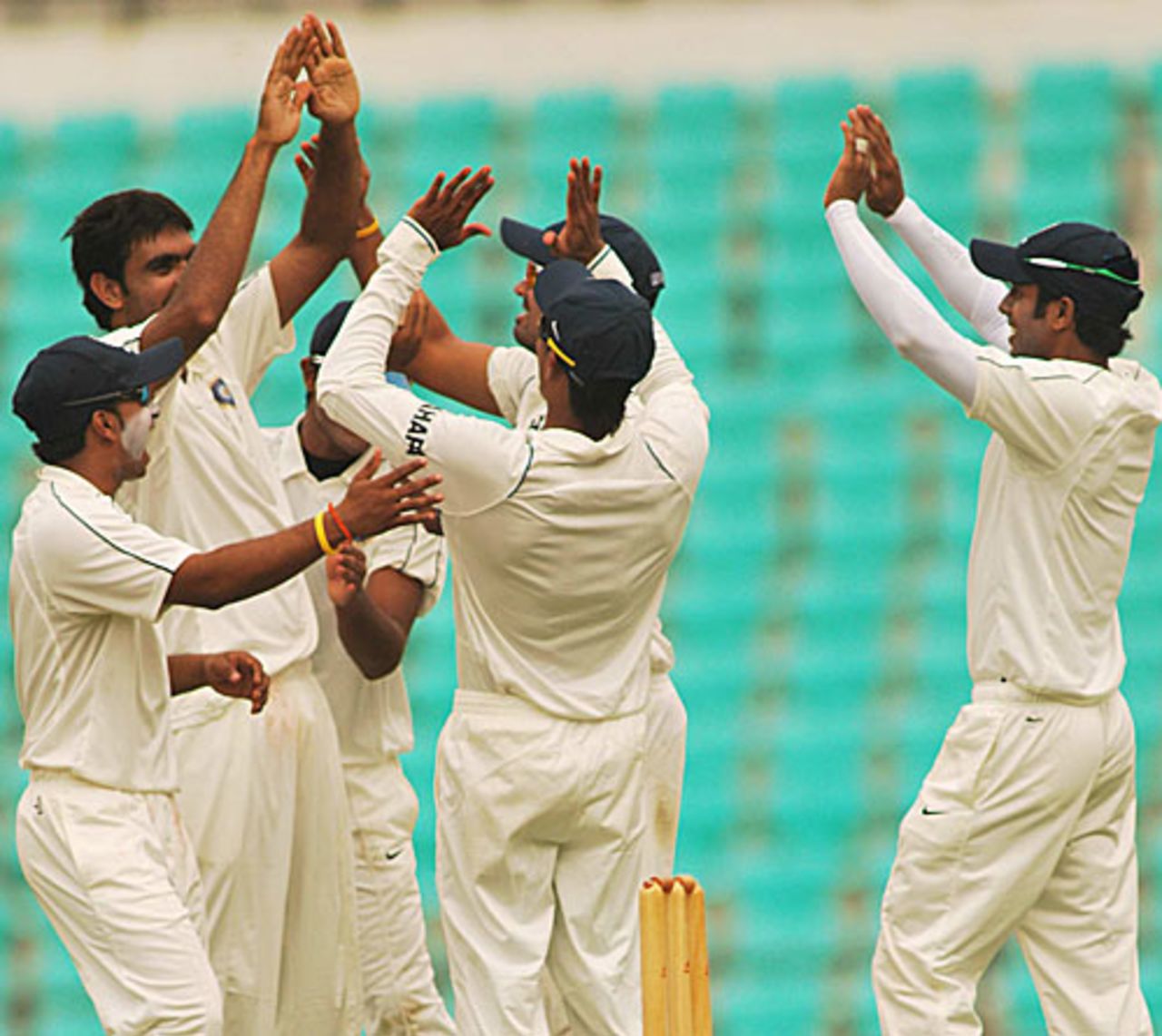 Munaf Patel and his team-mates celebrate a strike, Mumbai v Rest of India, Irani Cup, Nagpur, 2nd day, October 2, 2009