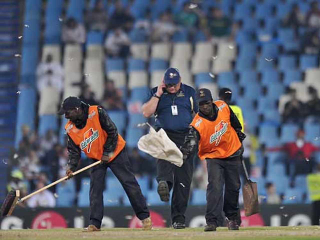Groundstaff try to clear another invasion of flying ants, Australia v New Zealand, Champions Trophy final, Centurion Park, October 5, 2009