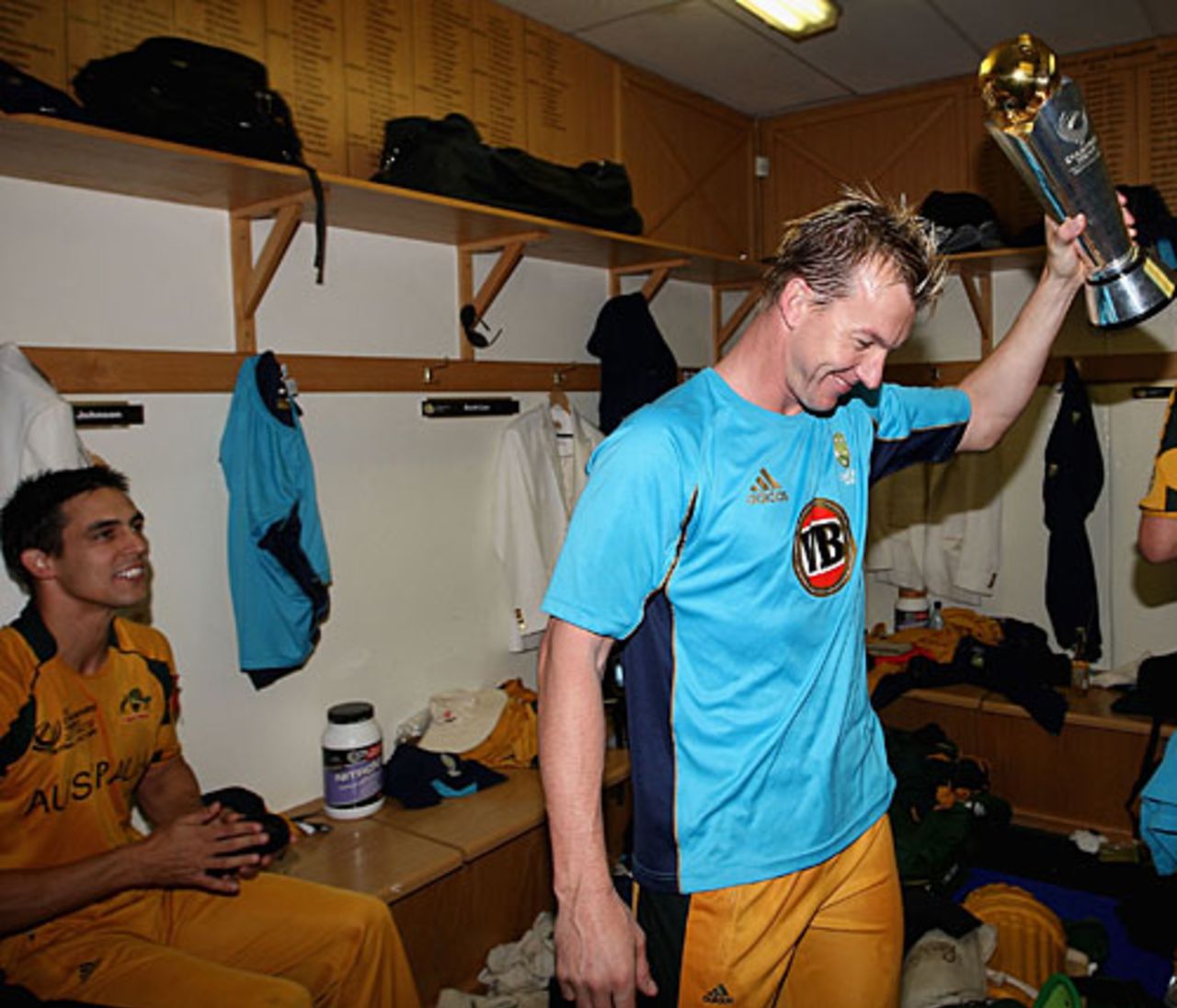 Brett Lee holds the trophy in the dressing room as Mitchell Johnson looks on, Australia v New Zealand, ICC Champions Trophy final, Centurion, October 5, 2009