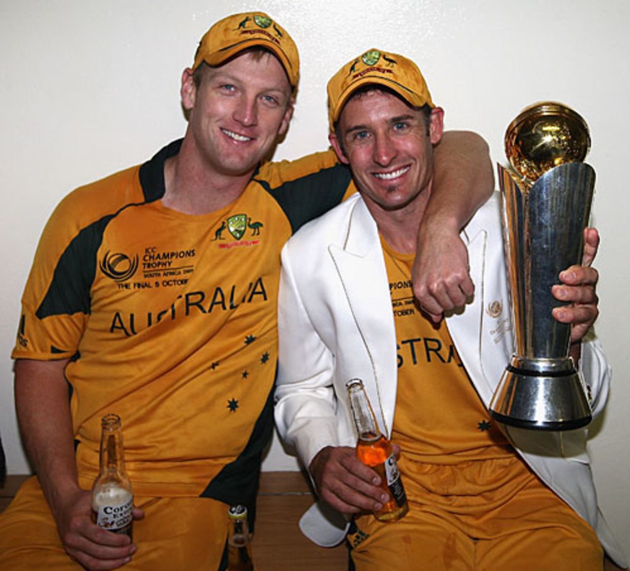Cameron White and Michael Hussey pose with the trophy and some beers, Australia v New Zealand, ICC Champions Trophy final, Centurion, October 5, 2009