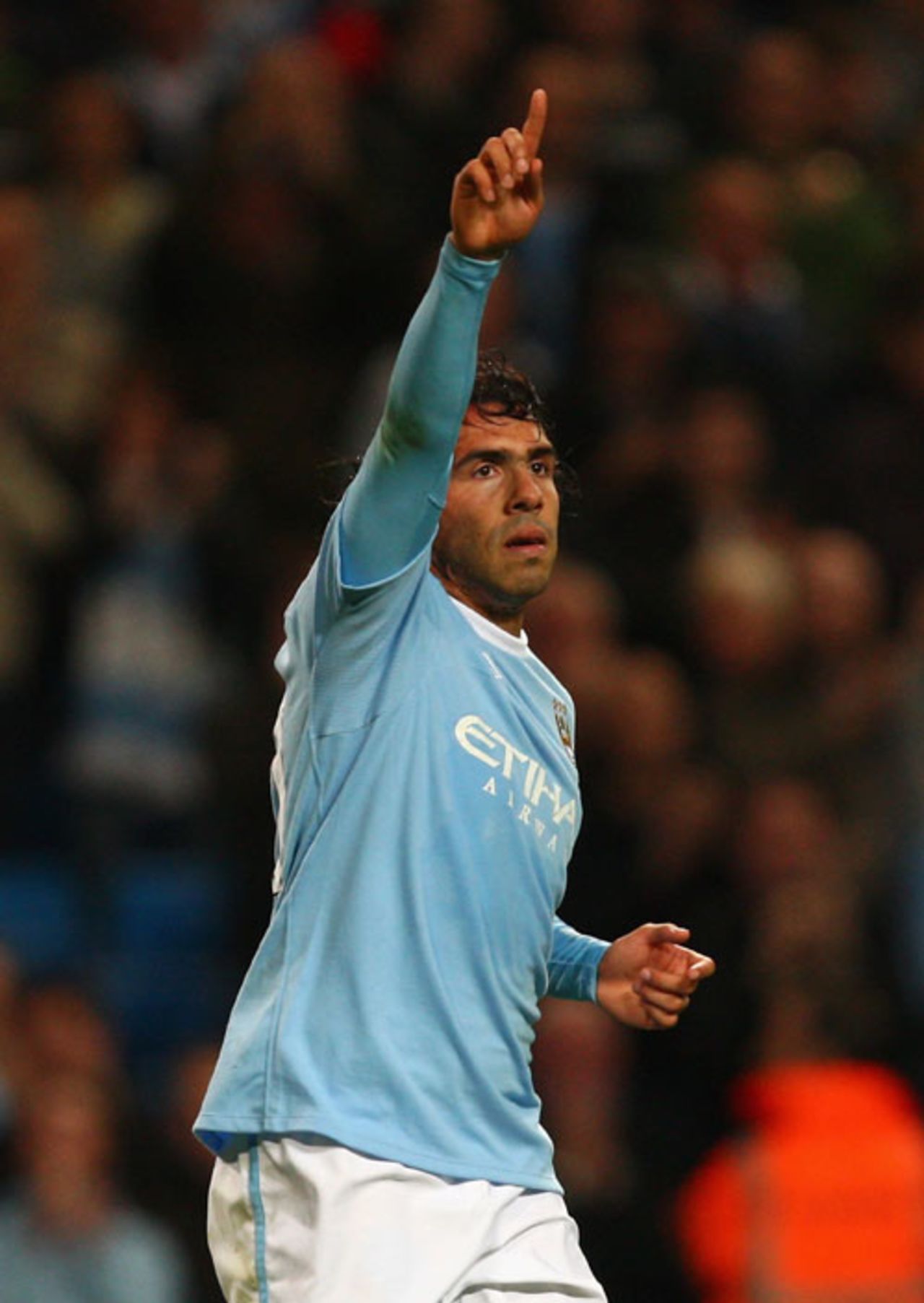 Carlos Tevez of Manchester City celebrates, September 28, 2009