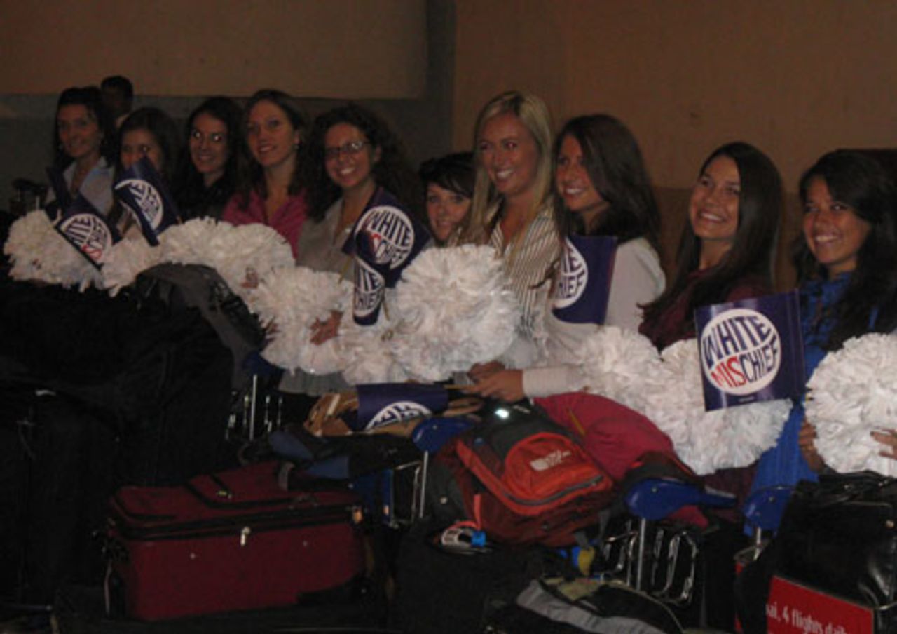 Members of the White Mischief Gal cheer squad for the Champions League 2009 arrive in India